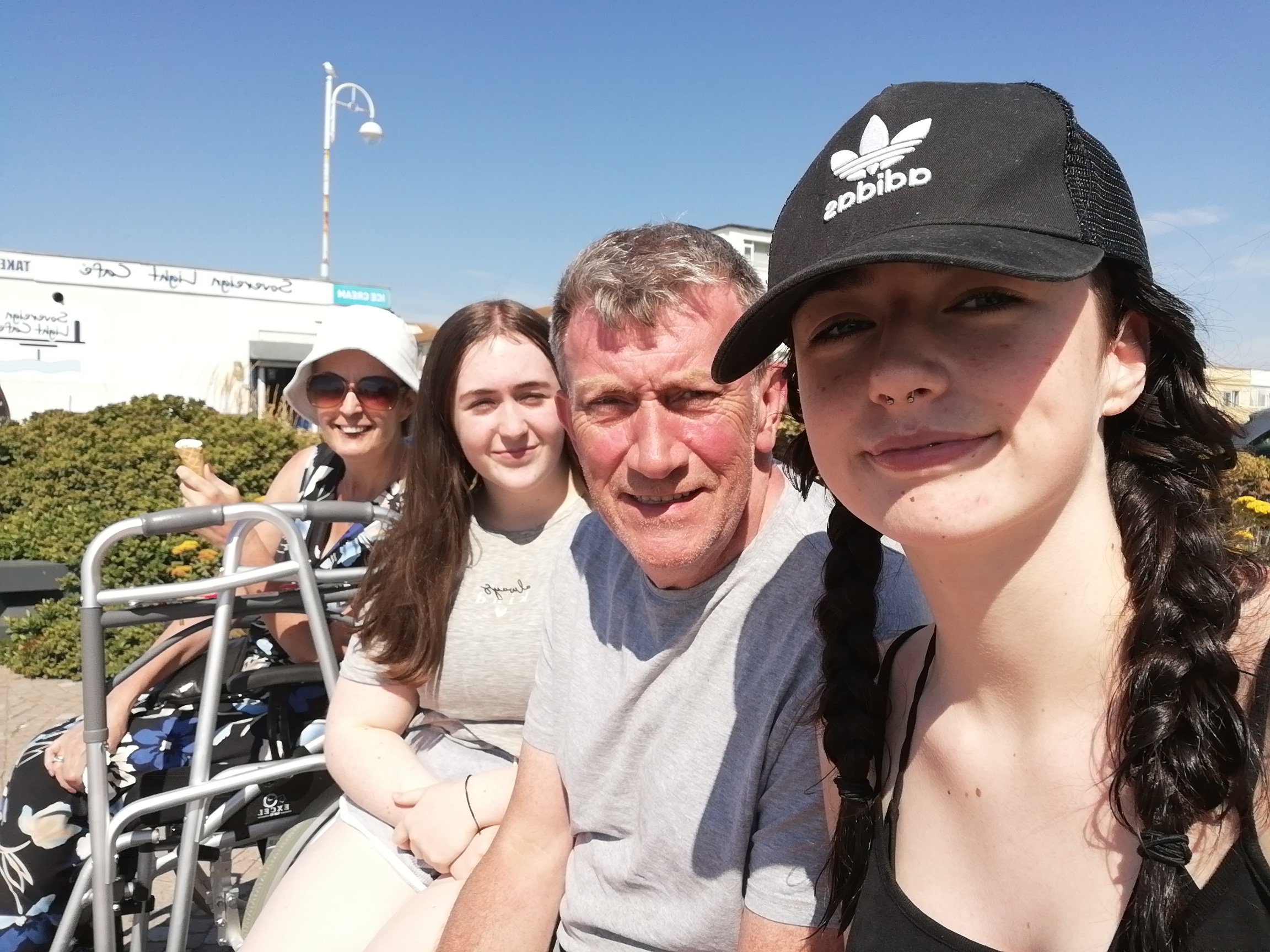 A family on holiday in the sun.